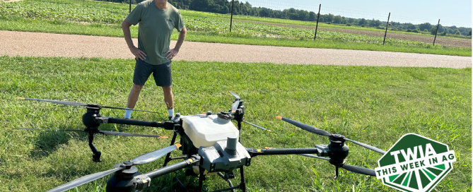 Image of author Fred Nichols standing behind a huge drone.