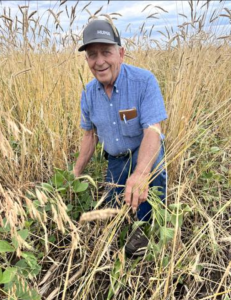 A photo of photographer Dan Hilger in a field.